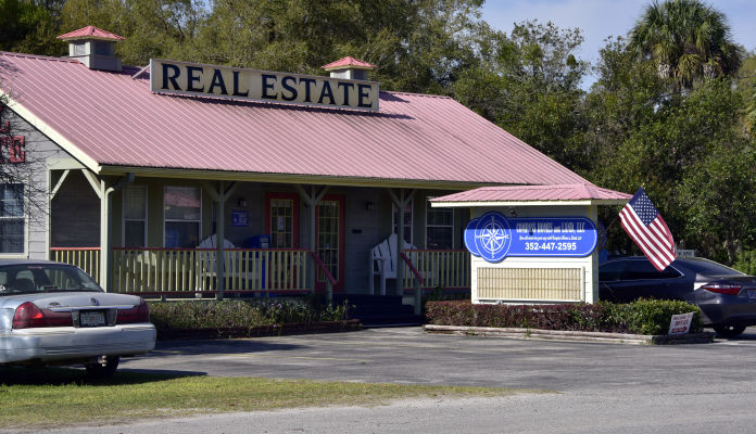 Compass Homes and Land Store Front Building
